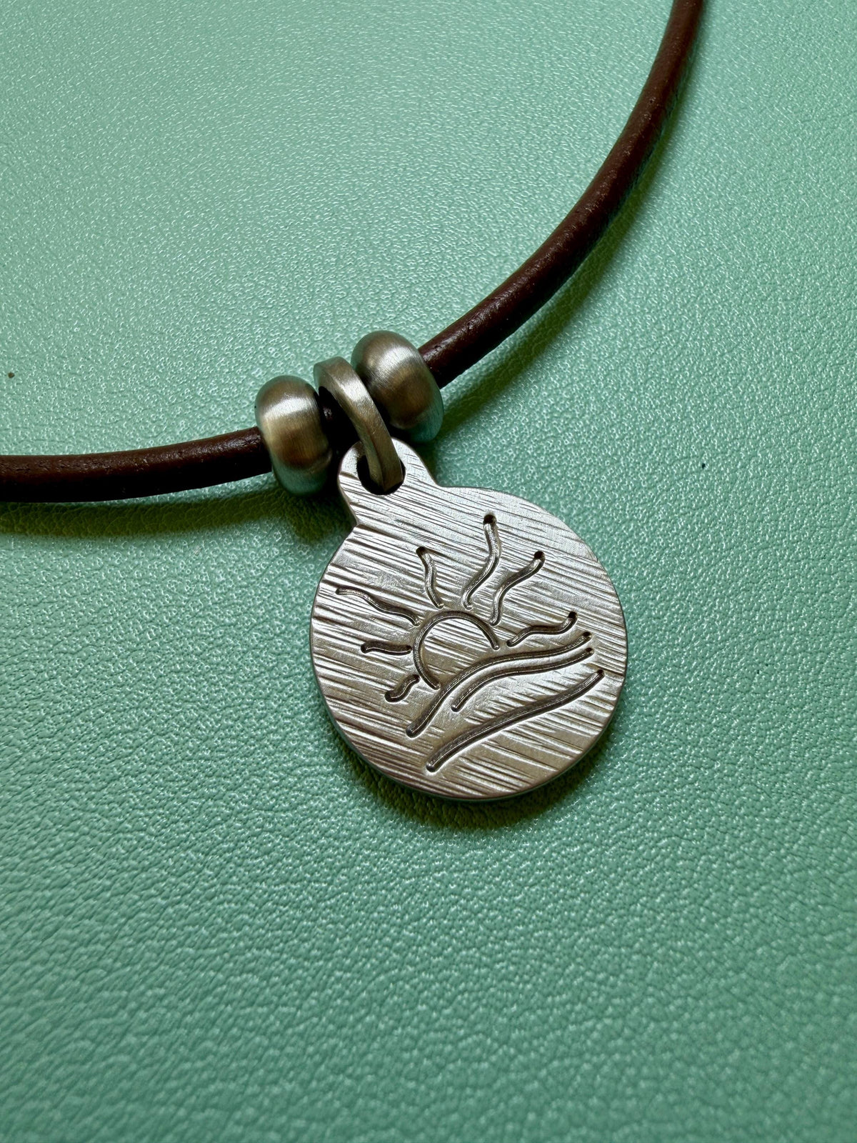 Diagonal Hatched Naturist Symbol Leather Necklace