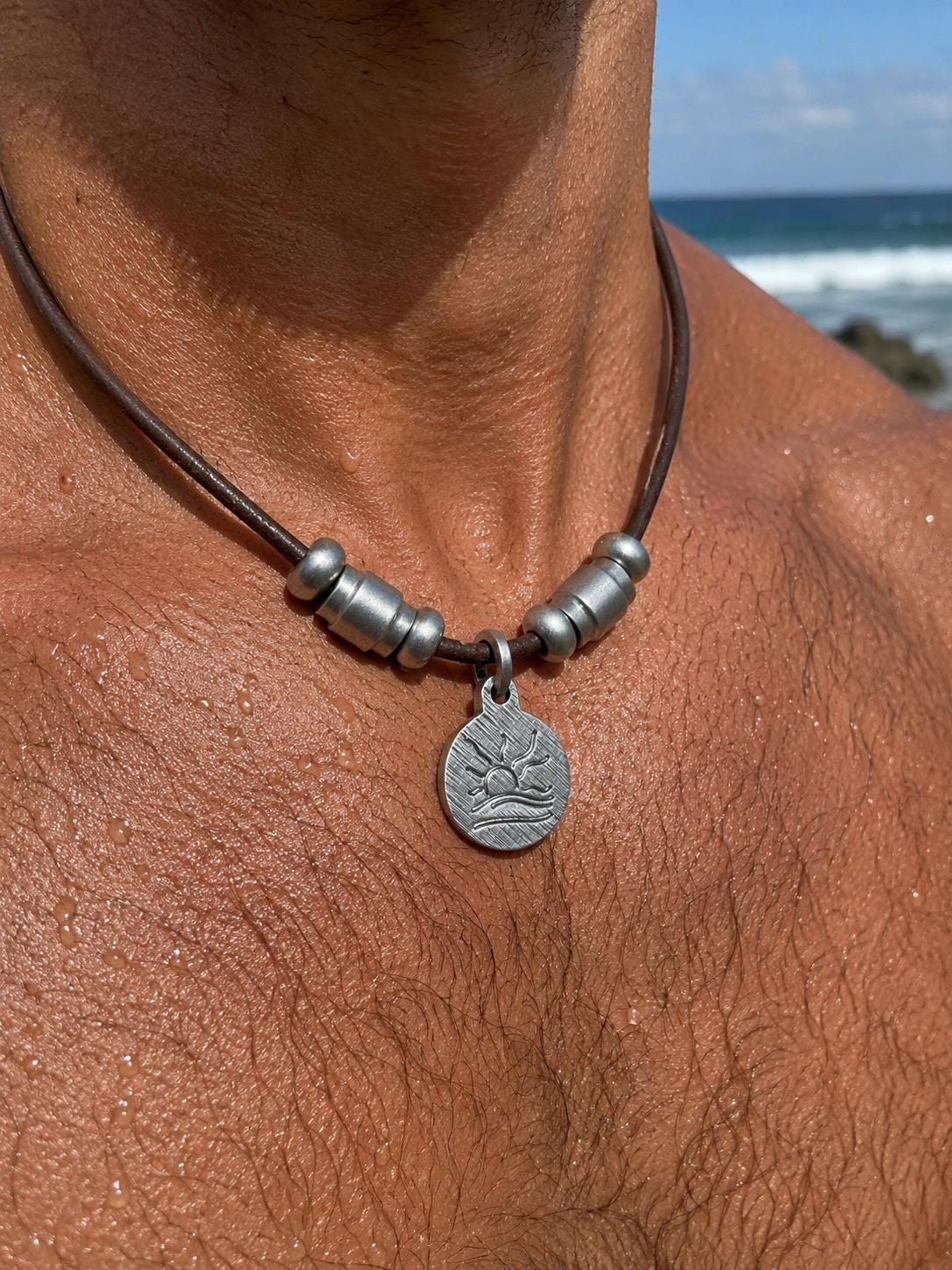 Barrel Bead Hatched Naturist Symbol Leather Necklace