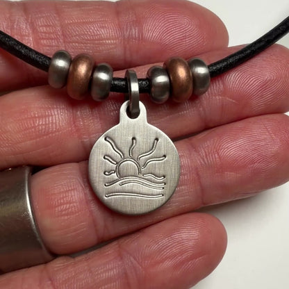 Copper Bead Hammered Naturist Symbol Leather Necklace
