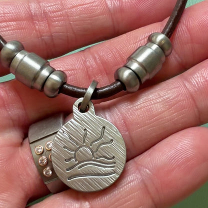 Barrel Bead Hatched Naturist Symbol Leather Necklace